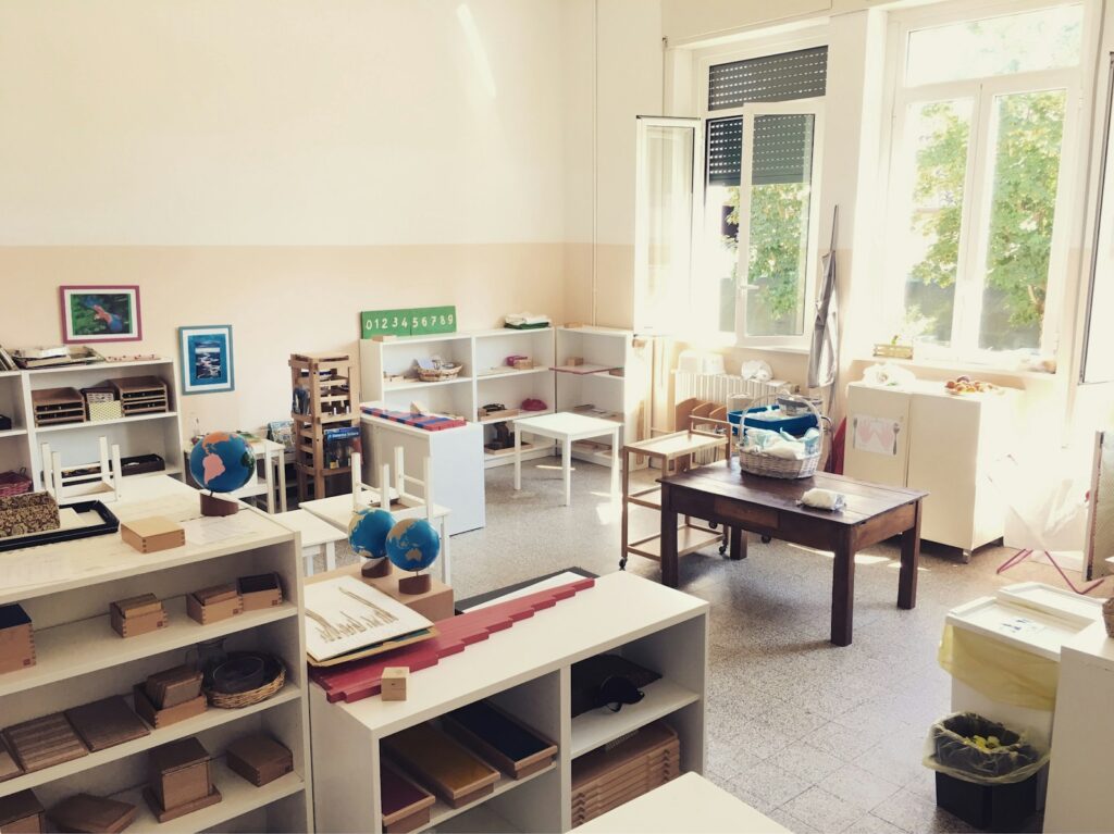 white wooden table with chairs